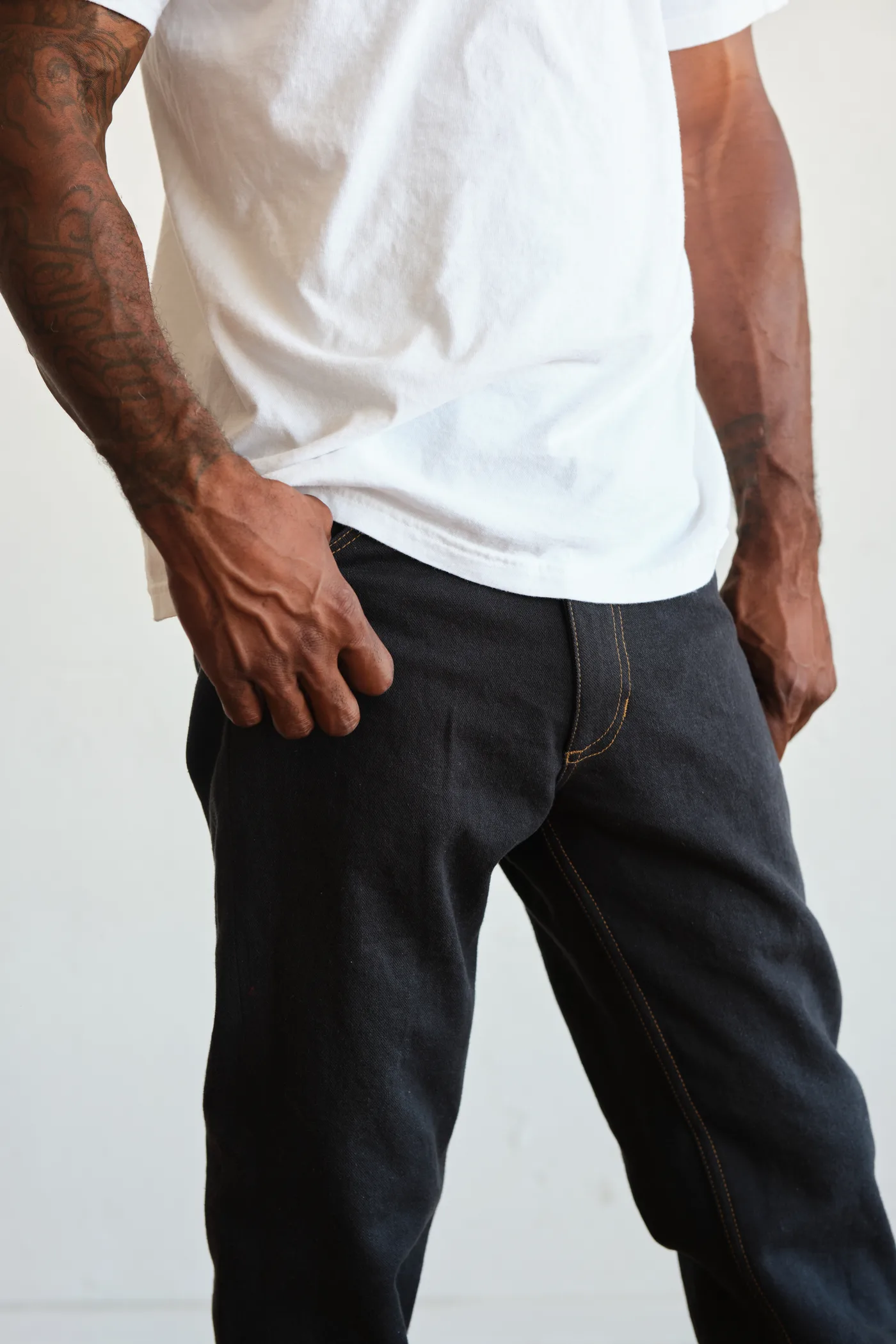 WTRLSS denim in raw indigo, worn — front